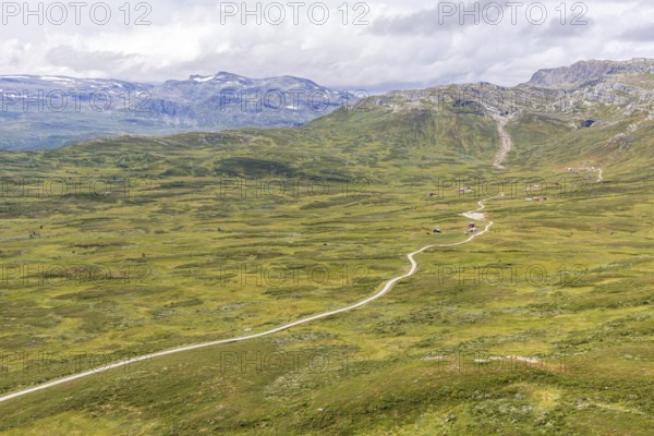 Gravel road through Jotunheimen National Park, view from Smørkollen mountain, Beitostølen,