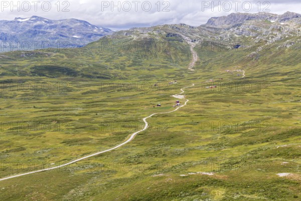 Gravel road through Jotunheimen National Park, view from Smørkollen mountain, Beitostølen,