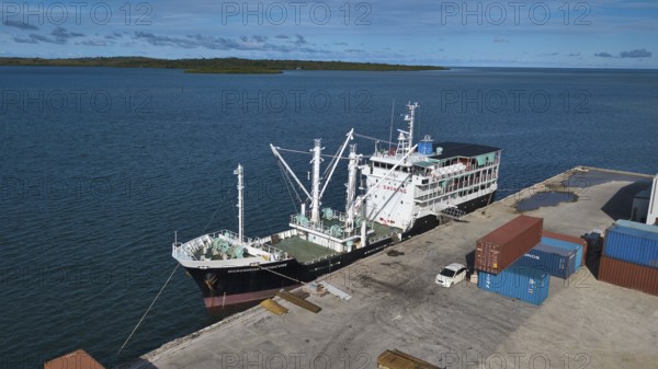 Ferry and supply vessel freighter Micronesian Navigators moored in the harbour of Colonia capital