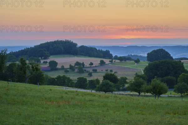 Landscape at sunrise with fields and trees at sunset, Laudenau, Reichelsheim, Odenwald, Hesse,