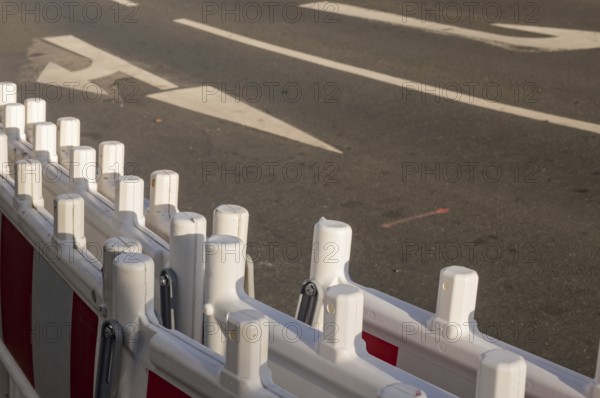 Borken, NRW, Germany, White and red plastic roadblock barriers are protecting road works, ensuring