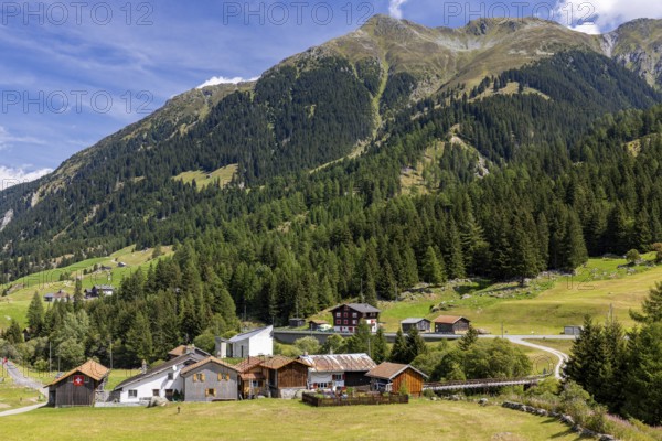 Hamlet with chapel of St James the Elder, Acla, Curaglia, Val Medel, Graubünden, Switzerland