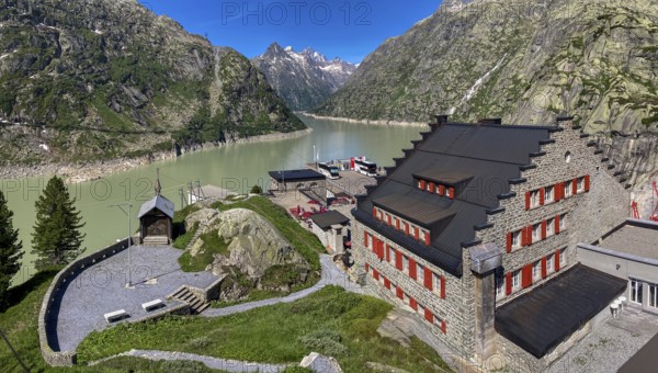 View from an elevated position to the right of the Grimselhospiz Hotel, built in 1932 on the