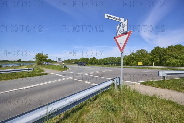 Landscape, roads, footpath and cycle path, crash barrier, traffic signs, give way, additional sign
