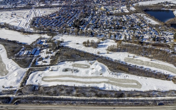 Aerial view, snow-covered golf course Huckingen and walkers, Huckingen, Duisburg, Ruhr area, North