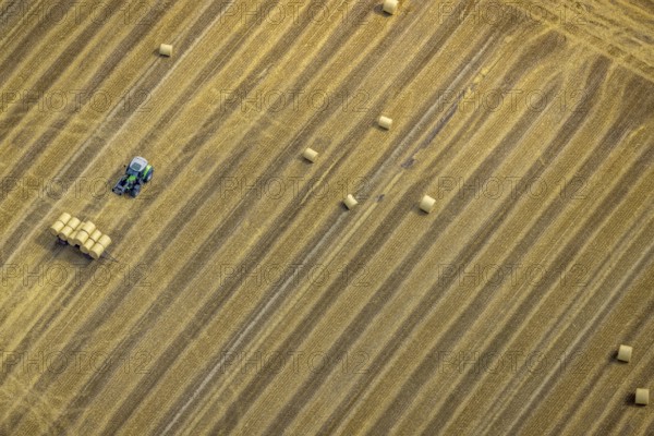 Aerial view, tractor harvesting grass, Mündelheim, Duisburg, Ruhr area, North Rhine-Westphalia,