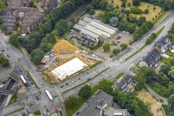 Aerial view, construction site and new building at the intersection of Sittardsberger Allee and