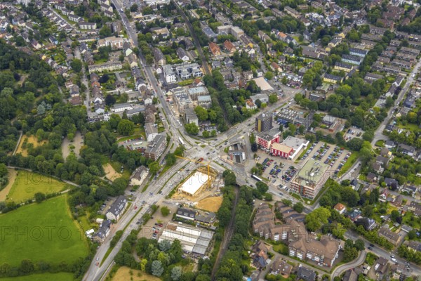 Aerial view, construction site and new building at the intersection of Sittardsberger Allee and