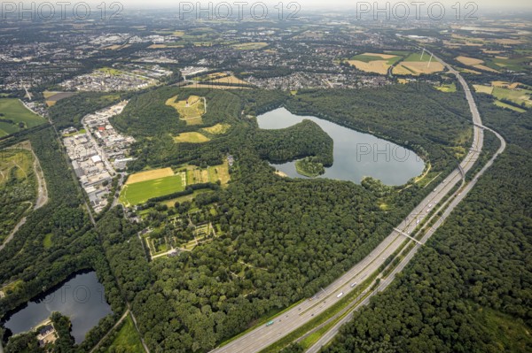 Aerial view, forest lake and slagheap Rheinpreussen, industrial area Gutenbergstraße, cemetery