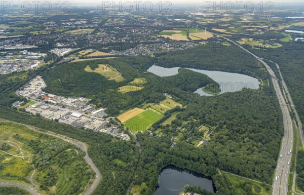 Aerial view, forest lake and slagheap Rheinpreussen, industrial area Gutenbergstraße, cemetery