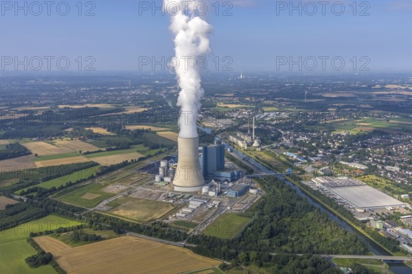 Aerial view of the power plant facilities and exhaust gas towers of the coal-fired power plant
