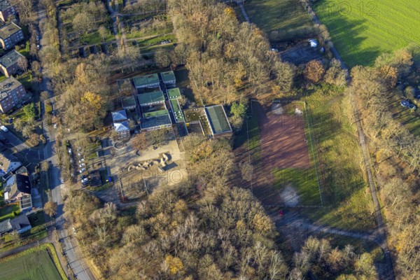 Aerial view of the Albert-Schweitzer-School and sports field in the district Hervest in the