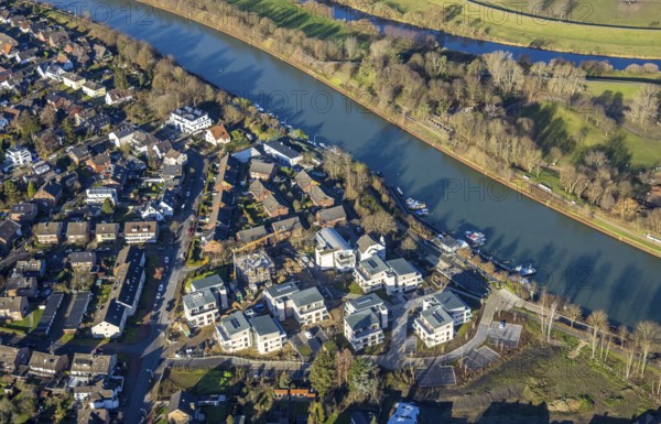 Aerial view of a construction site and new construction of residential buildings with barrier-free