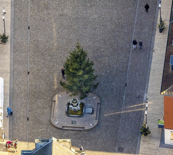 Aerial view of the Stirnberg fountain on the market square with Christmas tree in Dorsten in the