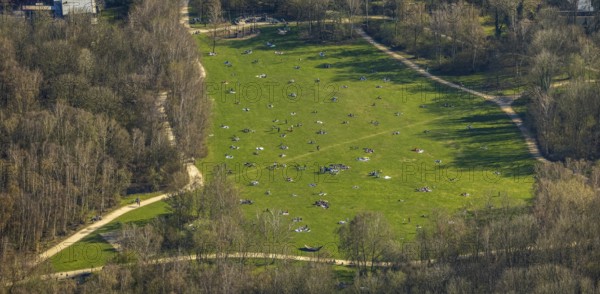 Aerial view, the Tremoniapark a large playground and sunbathing lawn, spring weather on Dortmund's