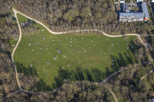 Aerial view, the Tremoniapark a large playground and sunbathing lawn, spring weather on Dortmund's