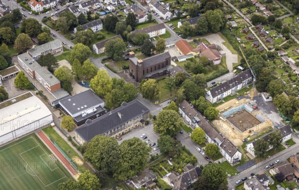 Aerial view, St. Charles Borromeo Catholic Church and Martin Luther King Comprehensive School in