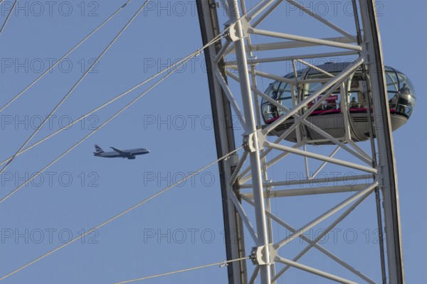 Airbus A320-232 jet passenger aircraft of British Airways airlines in flight in a blue sky with the