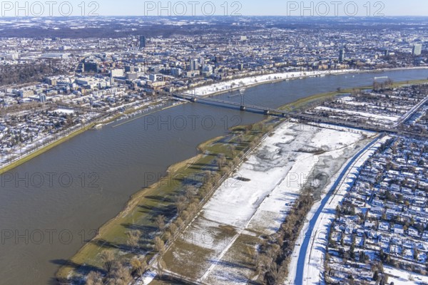 Aerial view, ice rink, ice skaters and pedestrians on frozen Rhine meadow in Lörrick near the