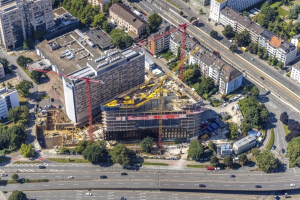 Aerial view, construction site and new construction of the three-storey Eclipse high-rise building