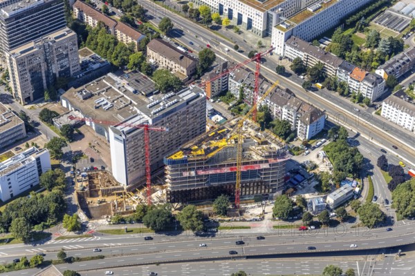 Aerial view, construction site and new construction of the three-storey Eclipse high-rise building