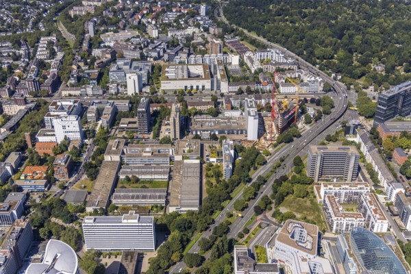 Aerial view, construction site and new construction of the three-storey Eclipse high-rise building