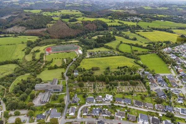 Aerial view, meadows and fields at Klevinghauser Straße between cemetery and sports field as well
