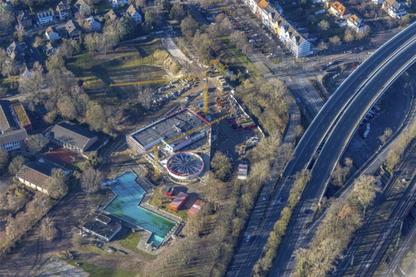 Aerial view, outdoor swimming pool Benrath with construction site and new building indoor swimming