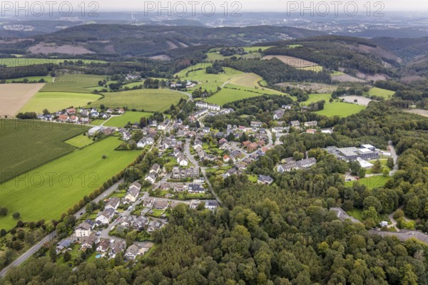 Aerial view, hilly landscape and local view with specialised hospital Homborn and short-term home