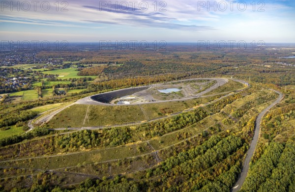 Aerial view, Haniel spoil tip and autumn forest in the Fuhlenbrock district of Bottrop, Ruhr area,