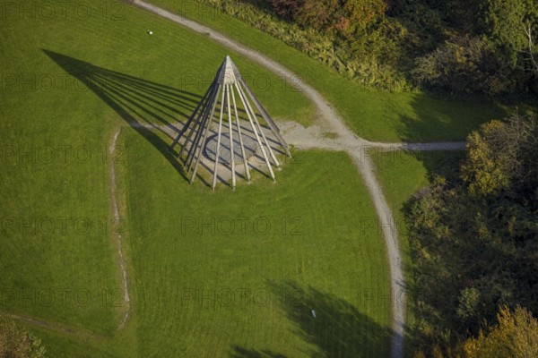 Aerial view, pyramid sculpture with shadows in the health park Quellenbusch in the district south