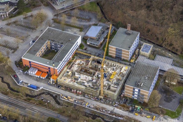 Aerial view, construction site and new building at Berufskolleg Berliner Platz, Hüsten, Arnsberg,