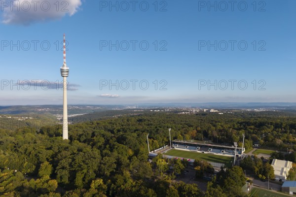 TV tower next to the Gazi stadium, with a view over extensive forests and soft clouds in the sky,