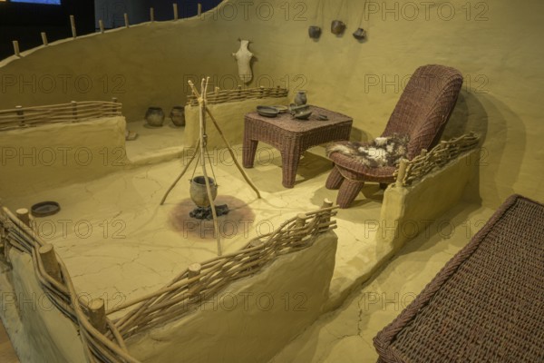Reconstruction of a house with fireplace and furniture, Museum of Vucedol Culture, Vukovar,