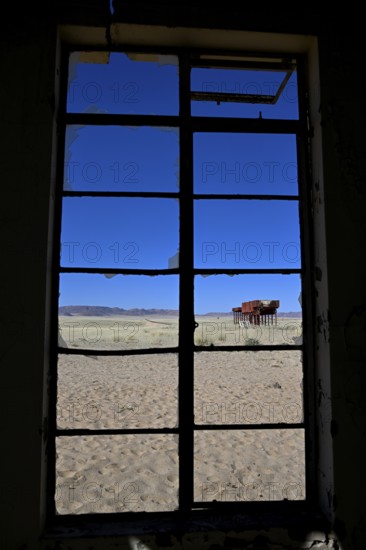 View from the window of the old German railway station of Garub into the Namib Desert, near Aus,