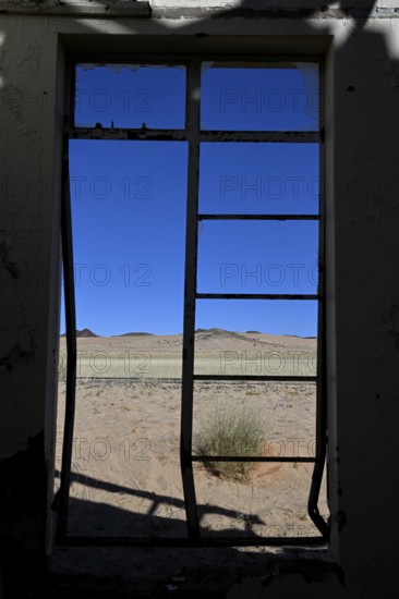 View from the window of the old German railway station of Garub into the Namib Desert, near Aus,