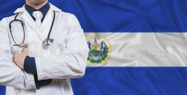 Male doctor with stethoscope on El Salvador flag. Doctor holding stethoscope on El Salvador flag