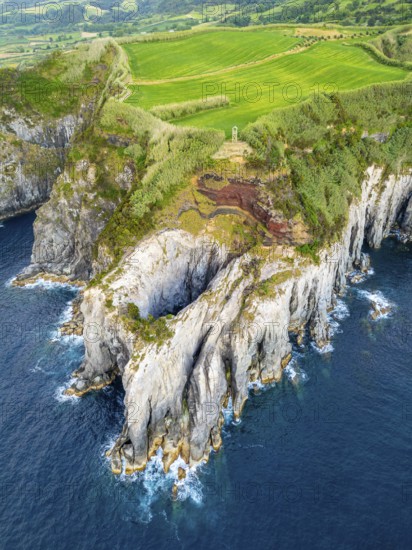 Cape Furado, Rocky Cliffs, Green Lush Fields, Pasturelands and Atlantic Ocean. Azores, Sao Miguel