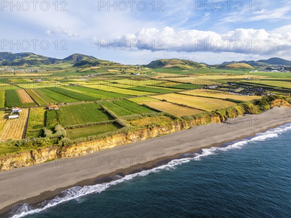 Areal de Santa Barbara Beach, Green Lush Fields and Atlantic Ocean. Azores, Sao Miguel Island.