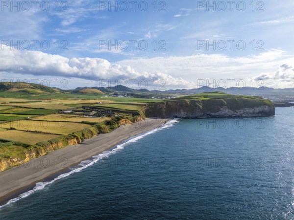 Areal de Santa Barbara Beach, Green Lush Fields and Atlantic Ocean on Sunny Day. Azores, Sao Miguel