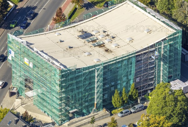 Aerial view, Hamm Municipal Music School, covered building and construction site with new building,