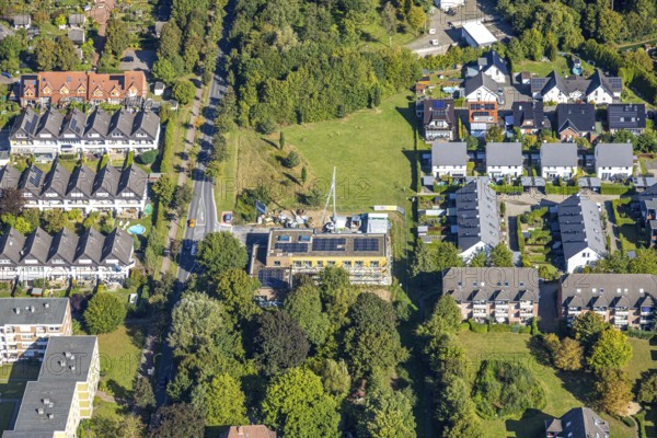 Aerial view, construction site with new building day care centre Villa Kunterbunt at