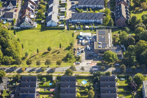 Aerial view, construction site with new building day care centre Villa Kunterbunt at