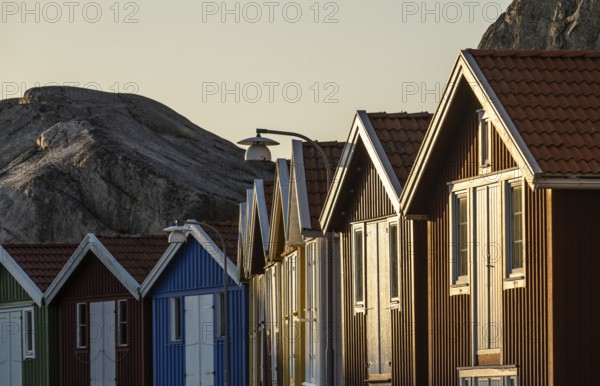 Boathouses between rocks in the harbour of Smögen, Smögenbryggan, Västra Götalands Län, Bohuslän,