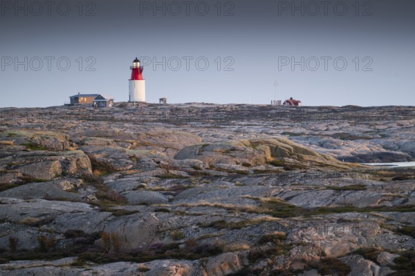 Lighthouse and houses in stony landscape, archipelago, Smögen, Smögenbryggan, Västra Götalands Län,