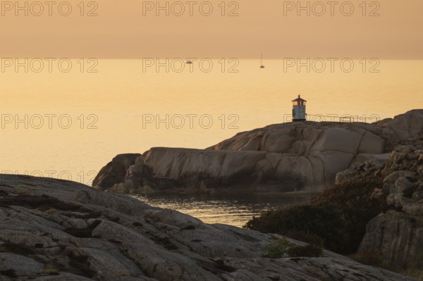 Small lighthouse at sunset, archipelago, Smögen, Smögenbryggan, Västra Götalands Län, Bohuslän,