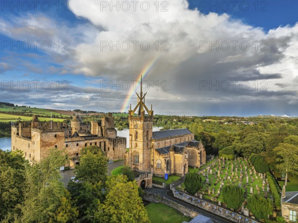 Rainbow over Linlithgow Palace from a drone, Linlithgow Loch, West Lothian, Scotland, United