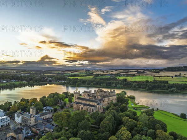 Sunset over Linlithgow Palace from a drone, Linlithgow Loch, West Lothian, Scotland, United Kingdom