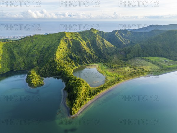 Lagoa do Fogo Lake on Sunny Morning. Green Lush Hills and Mountains. Azores, Sao Miguel Island.