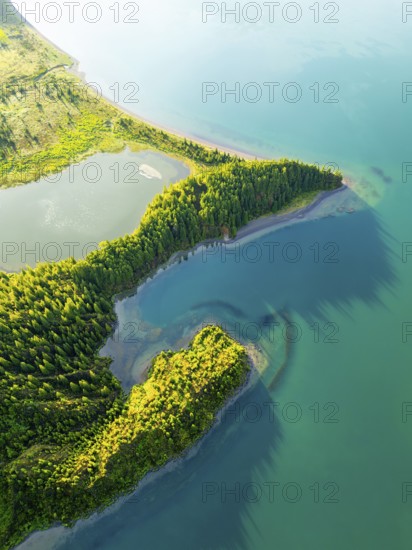 Lagoa do Fogo Lake at Sunrise. Green Lush Hills and Forest. Azores, Sao Miguel Island. Portugal.